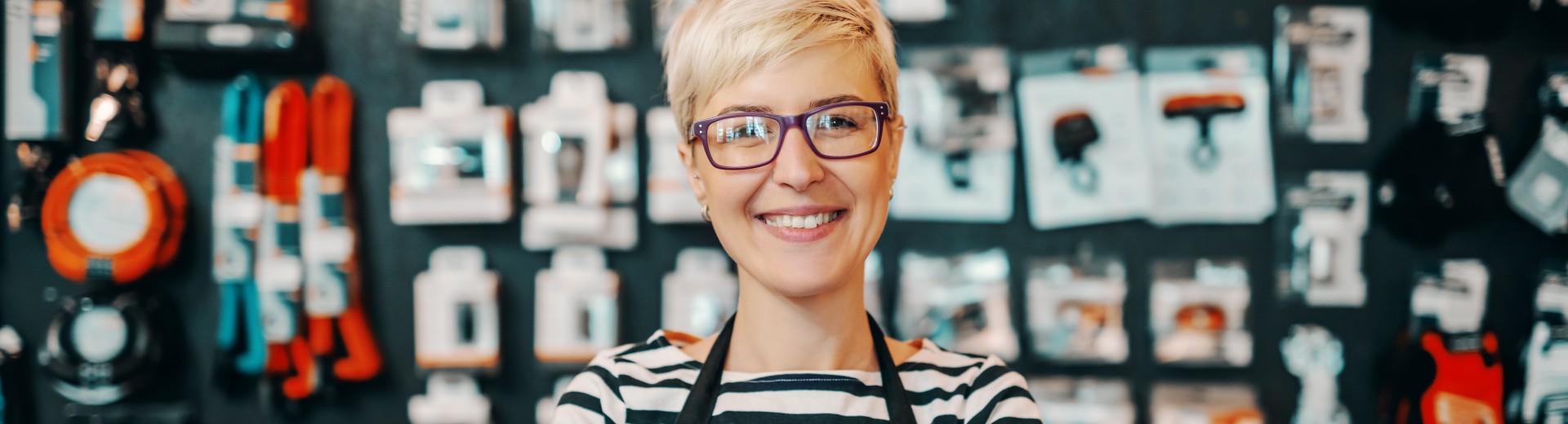 Smiling shop owner