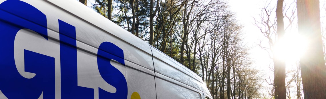 A GLS van in the sunny woods