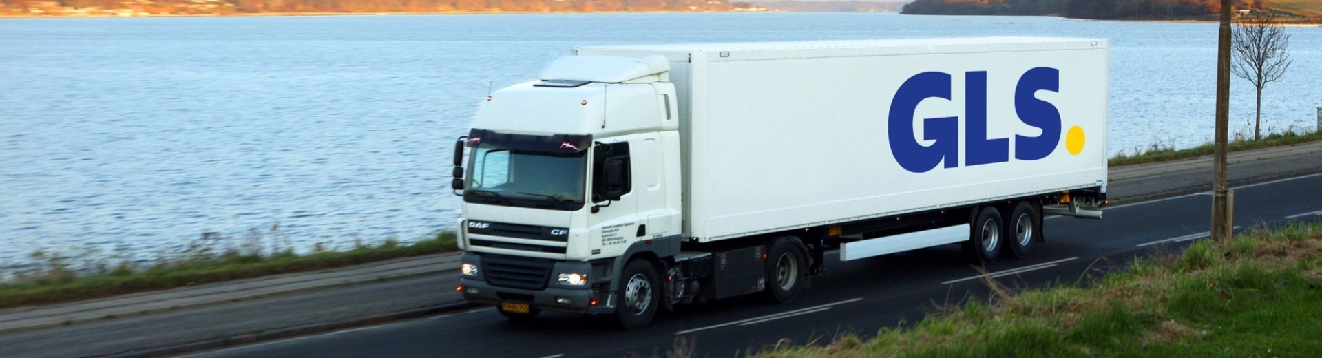 Truck driving by the water