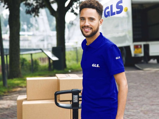 Deliveryman unloads his truck