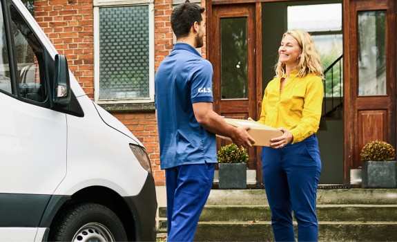 Business customer recieving parcel from GLS